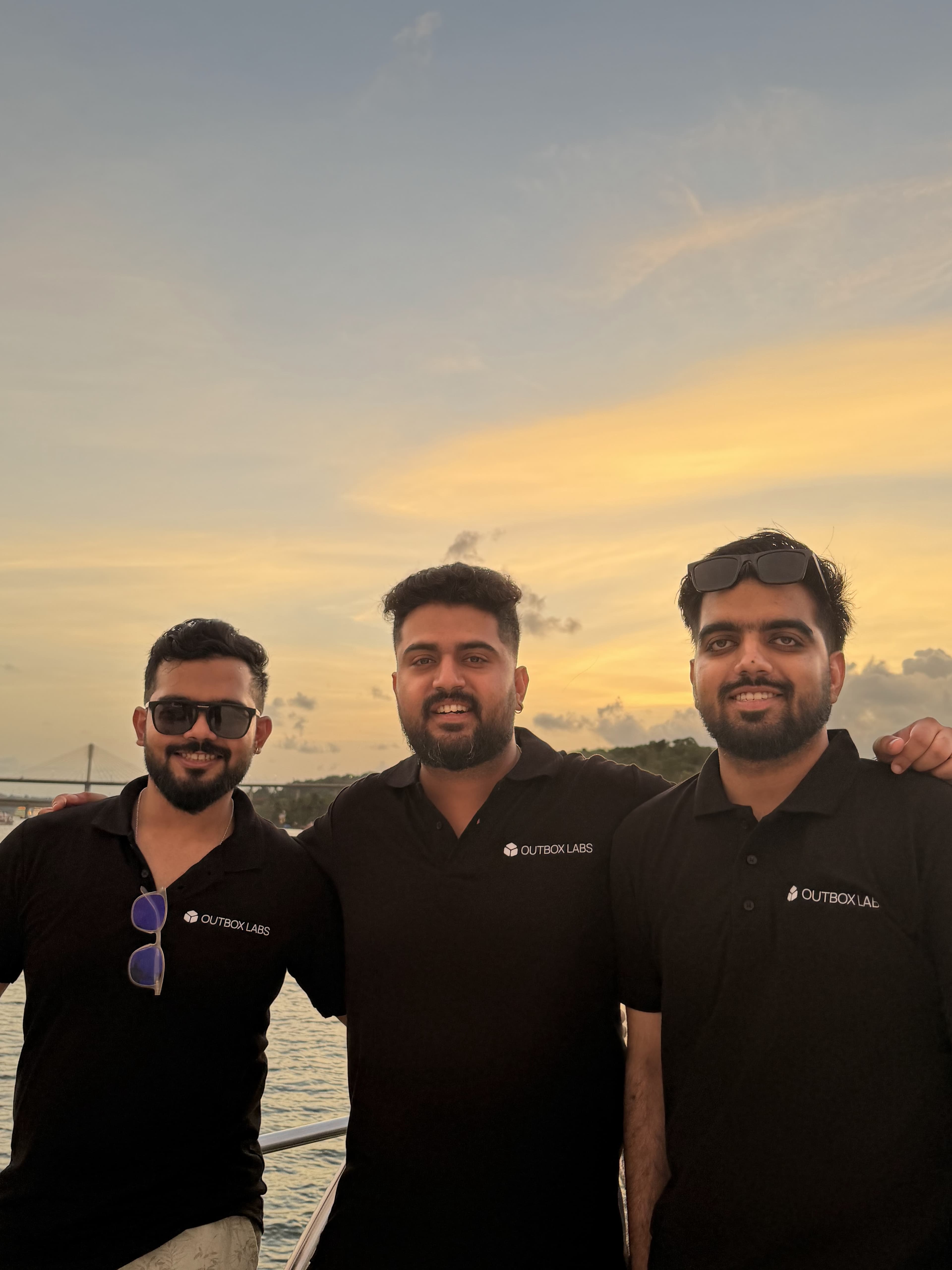 The Outbox Labs team together at sunset